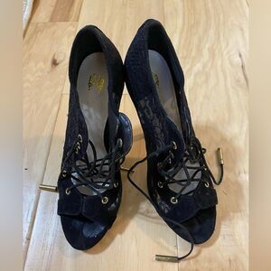Victoria’s Secret Lace up black Ankle booties. Excellent condition. Size 7